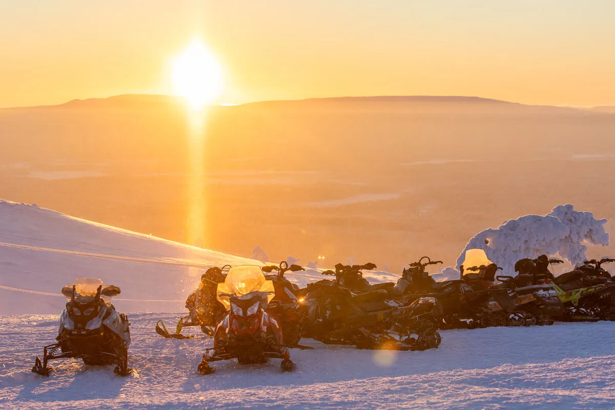 A guided snowmobile safari in Finnish Lapland, available from Levi or Rovaniemi, with private door-to-door transfers before and after the ride. Choose a two-to-four-hour route through snowy forests and frozen landscapes, with specialist safari guidance and safety equipment included.