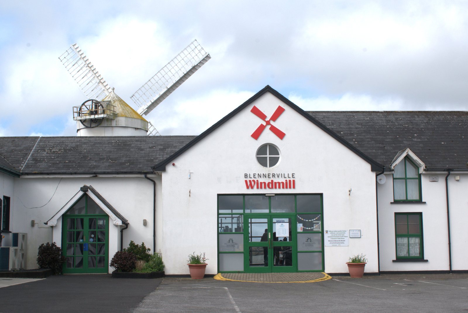 Blennerville Windmill visitor centre with the windmill behind