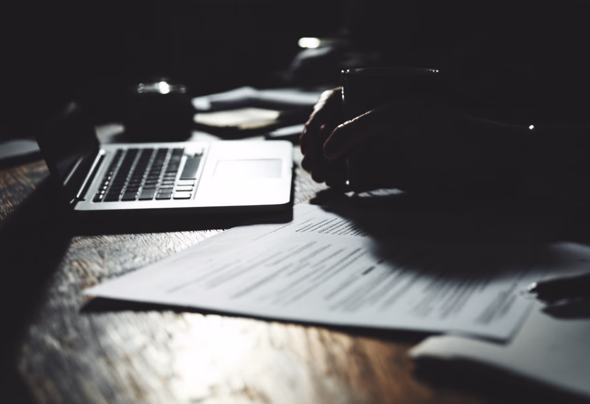 [background image] image of a writing desk with a laptop (for an insurance agency & company)