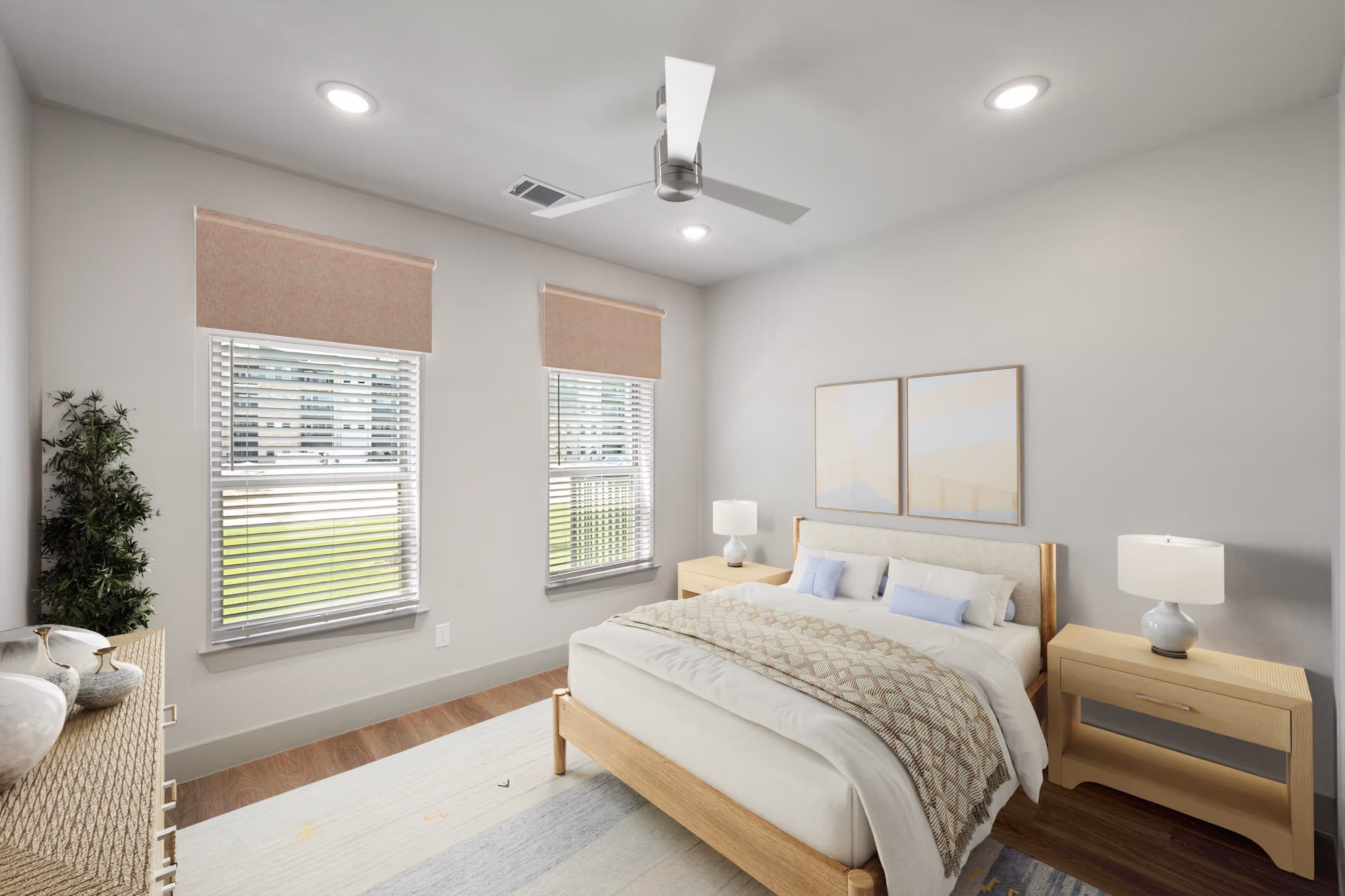 plank flooring bedroom with windows