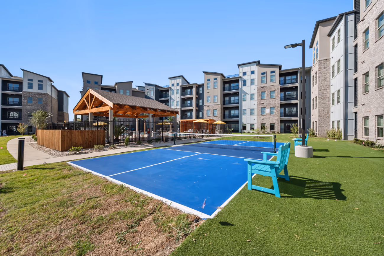 Pickle ball court near pool