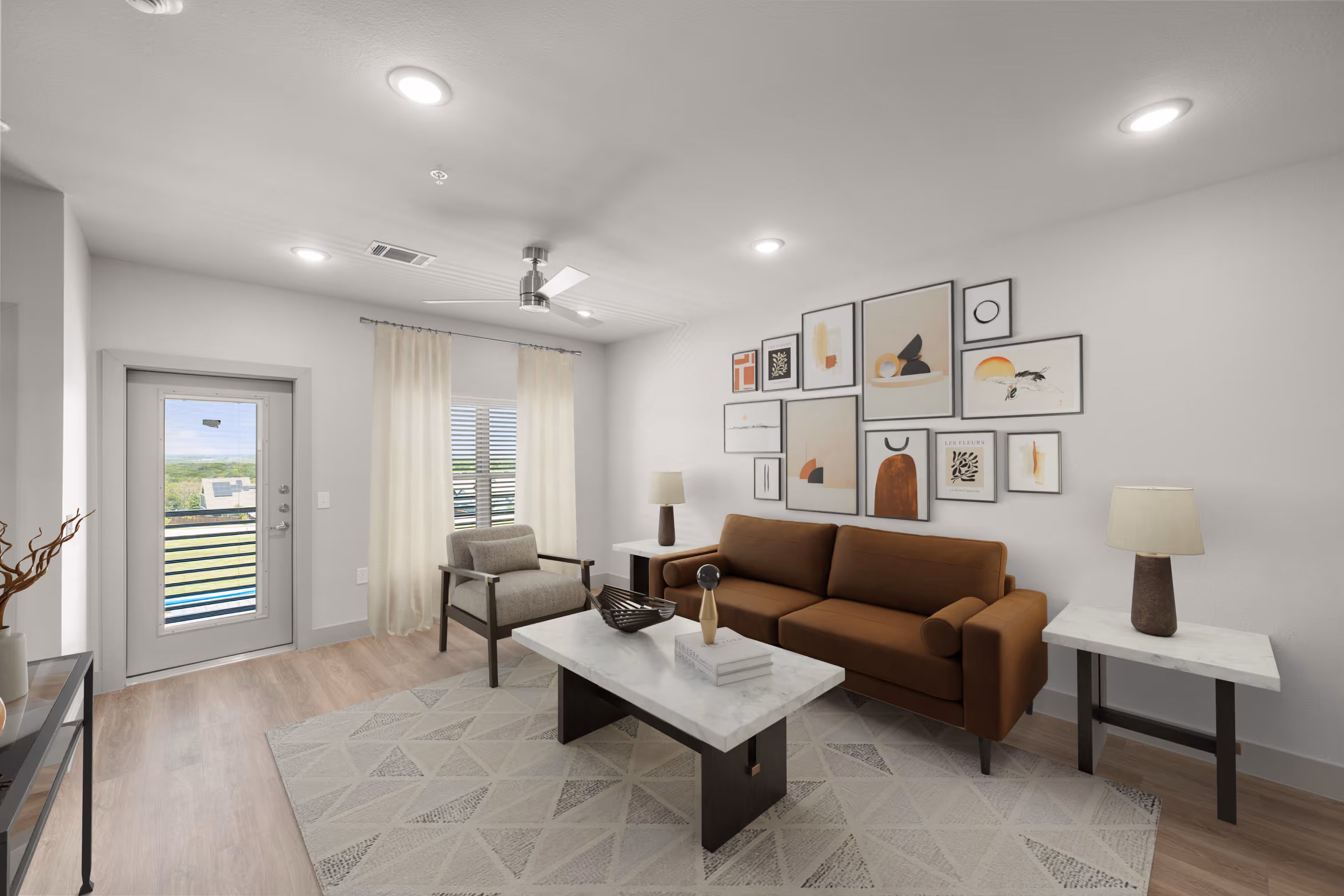 Living room with a couch and plank flooring