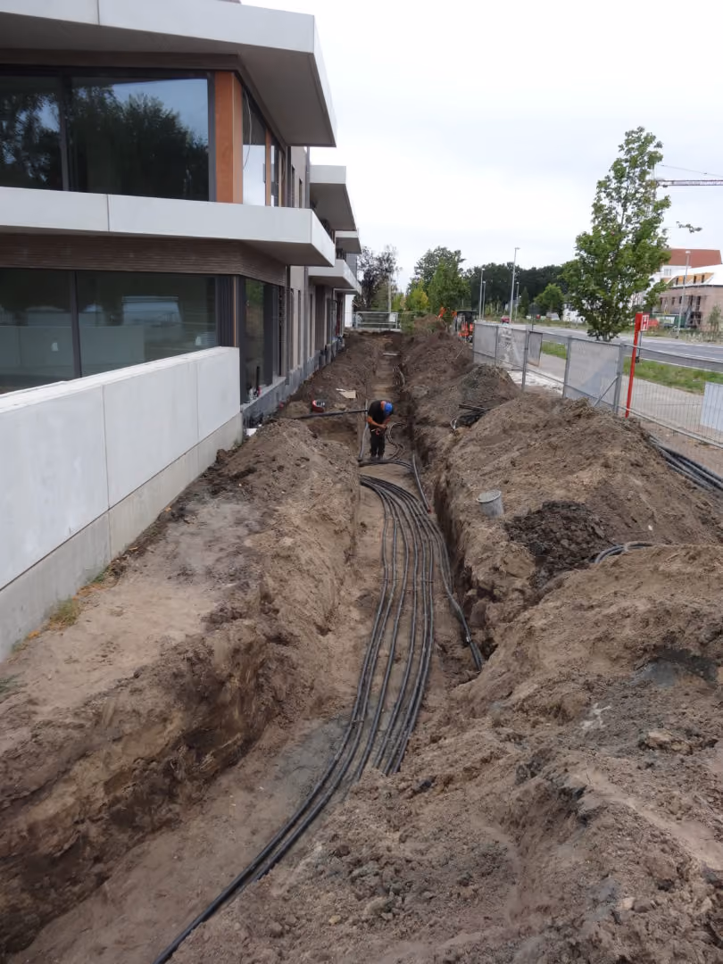 Vloerverwarming in het gebouw met dokterspraktijken en appartementen in Schilde