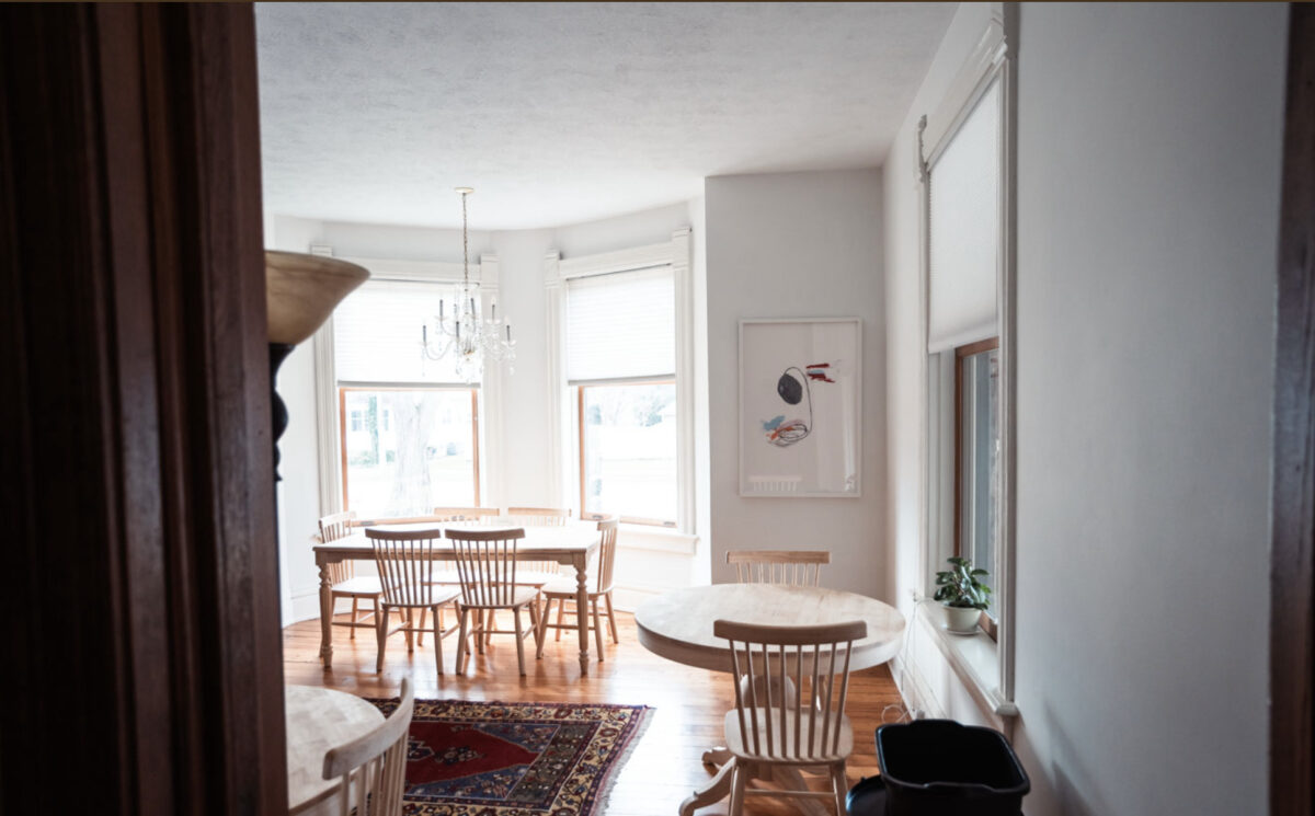 Dining area with table and chairs in charming Holland, MI.