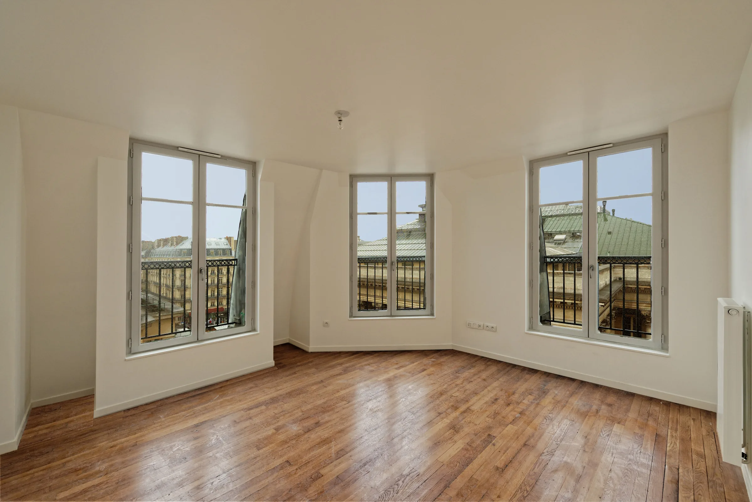 Séjour — transformation d'un immeuble de bureaux en logements sociaux, place de la Bourse, Paris 2e