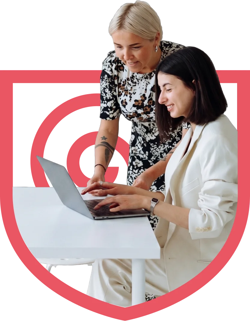 Two businesswomen managing their company with their system