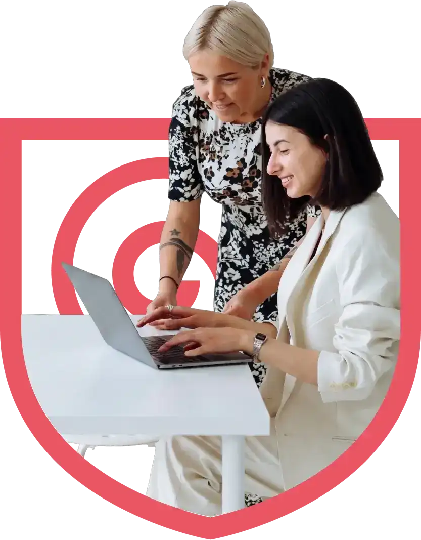 Two businesswomen managing their company with their system