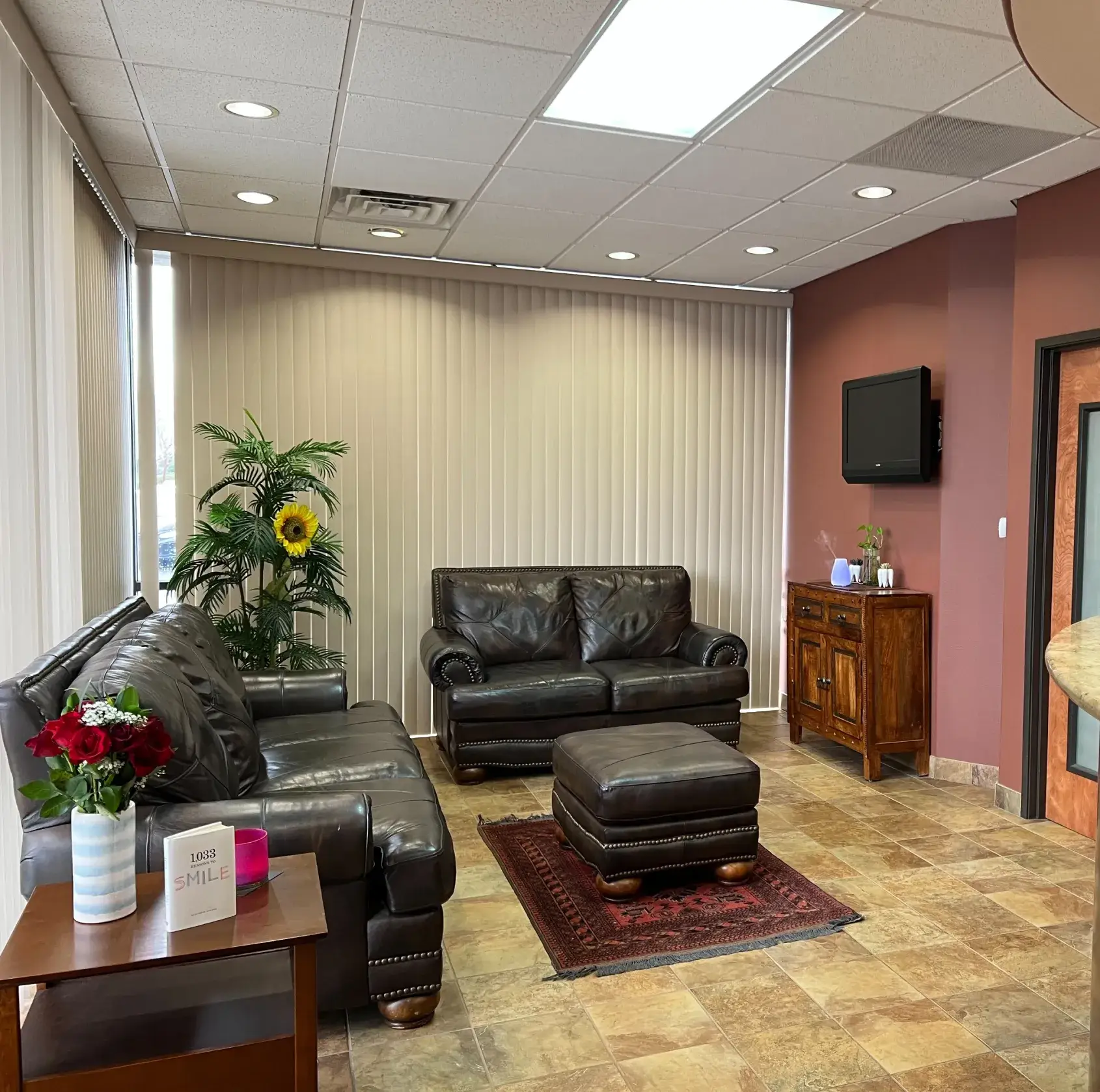 A living room filled with furniture and a flat screen tv.