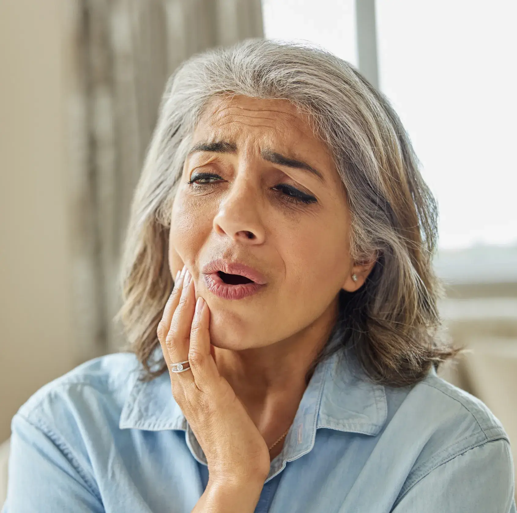 A woman with a surprised look on her face.