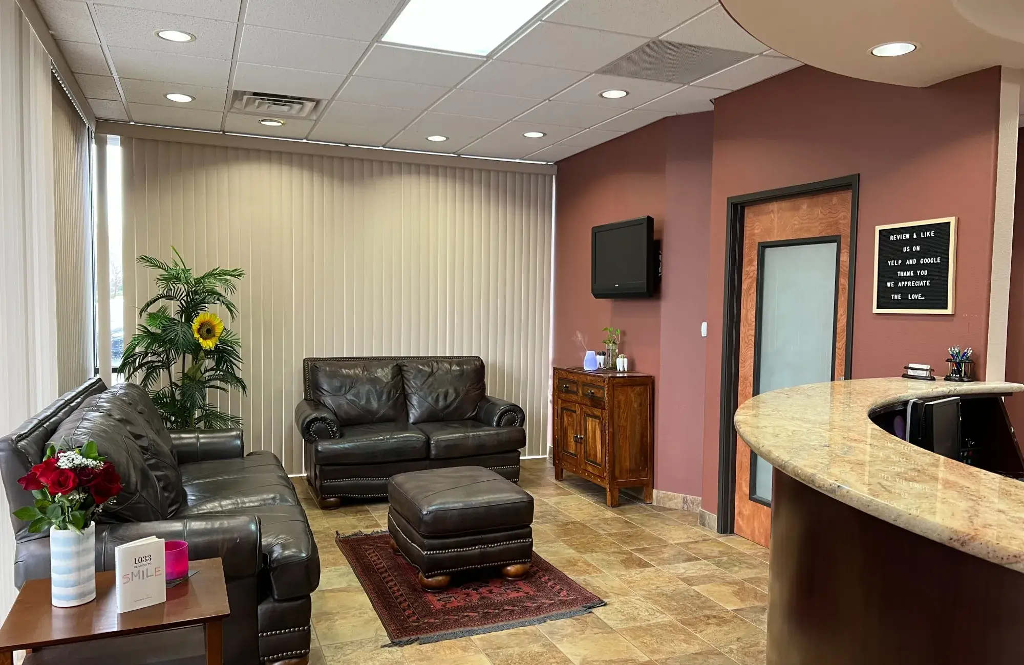 A living room filled with furniture and a flat screen tv.