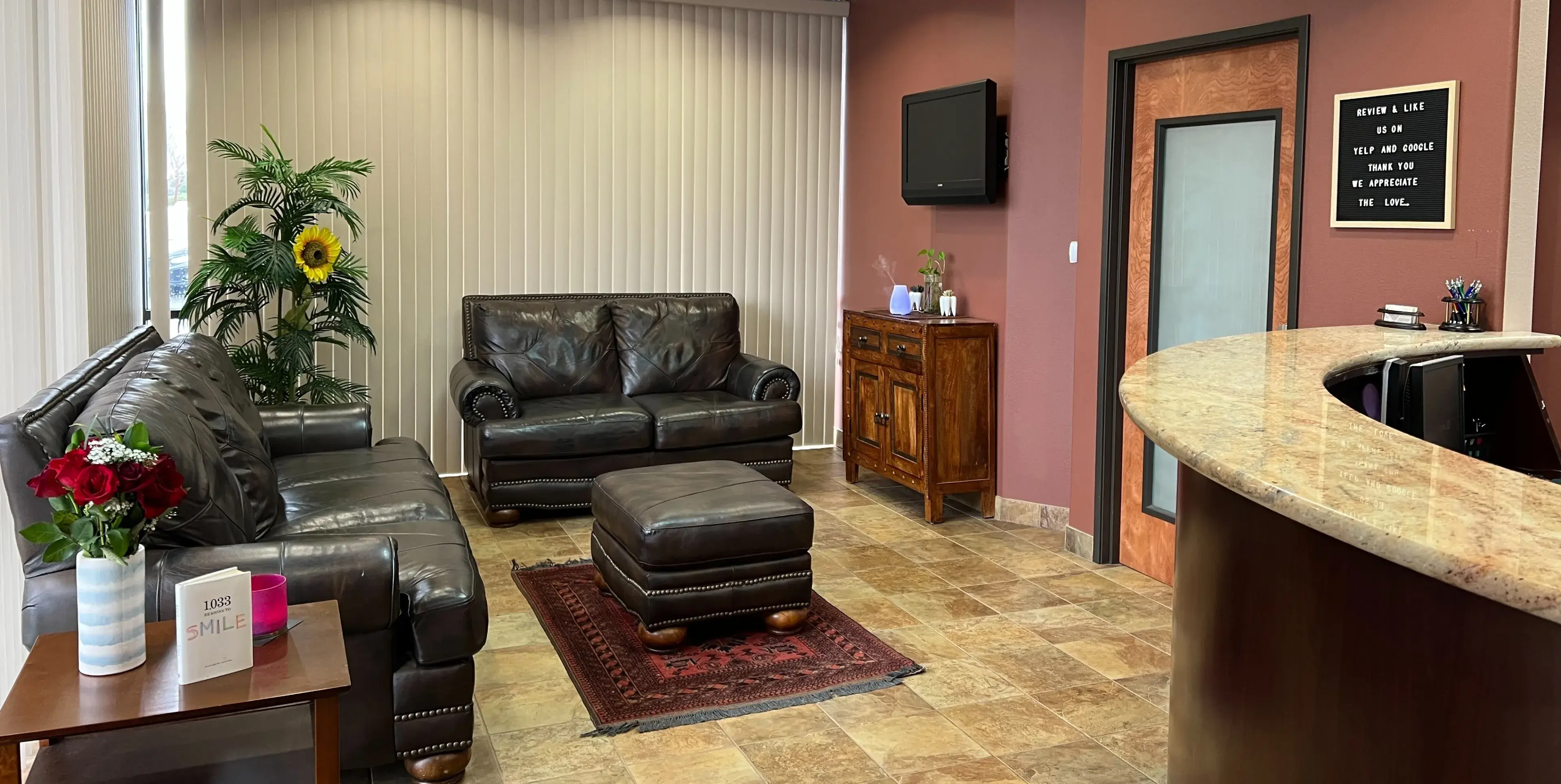 A living room filled with furniture and a bar.