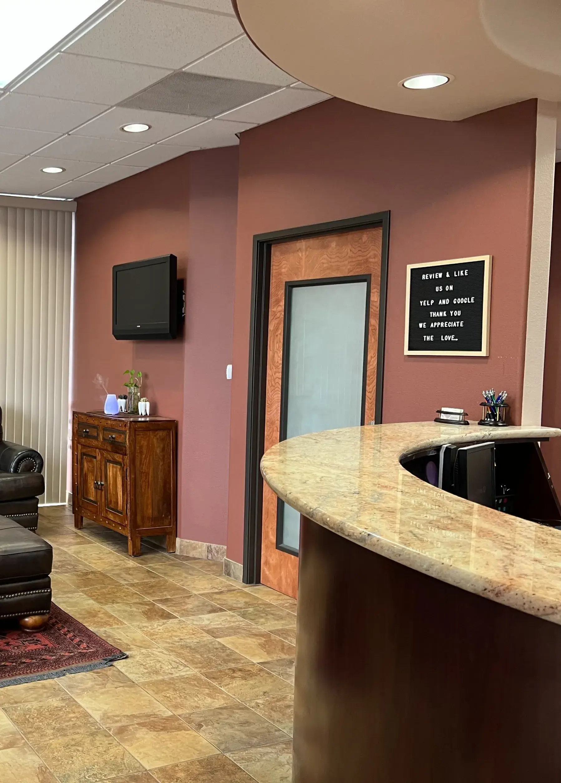 A living room filled with furniture and a flat screen tv.