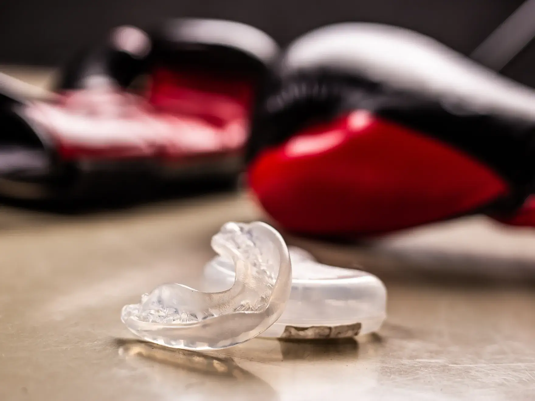 A close up of a pair of shoes on a table.