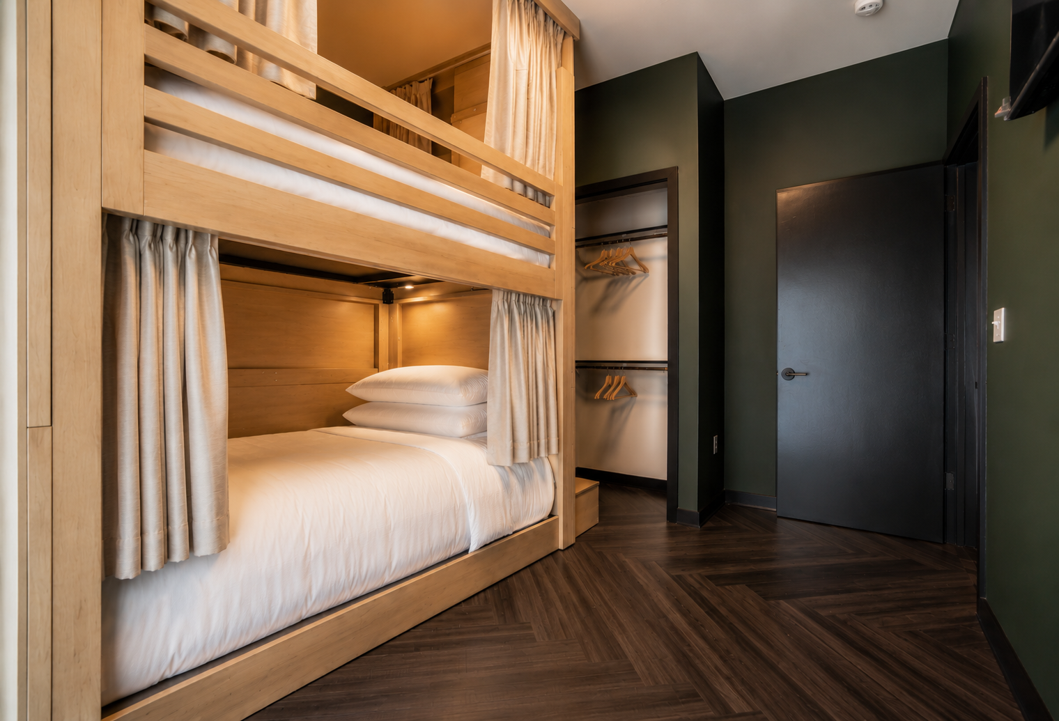 Large bunk beds with stairs at The Quinley