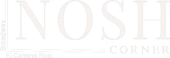 Logo of Nosh Corner in white