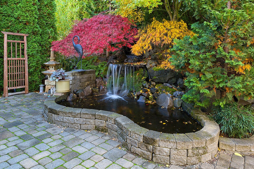 Retaining wall surrounding a flower garden