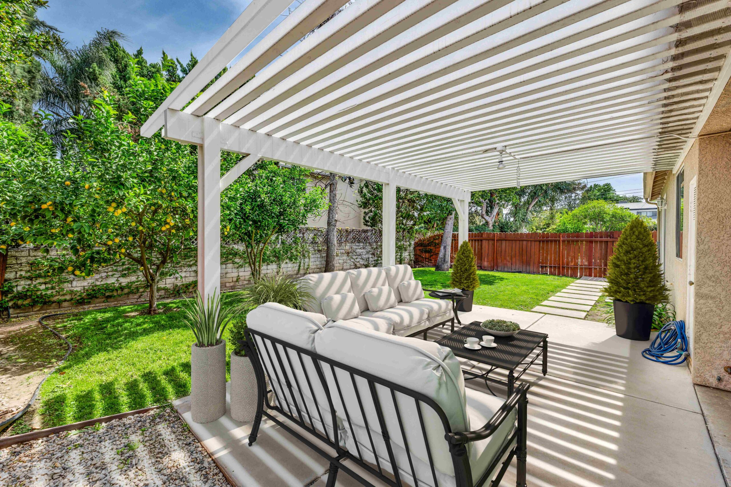 patio cover vs pergola scaled | Opulands Landscape Design & Construction