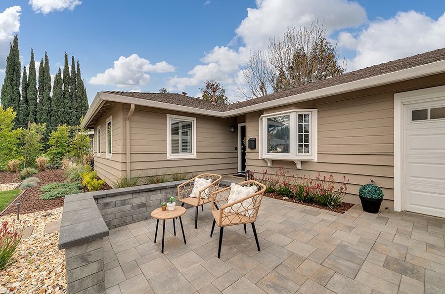front yard paver patio with seating area