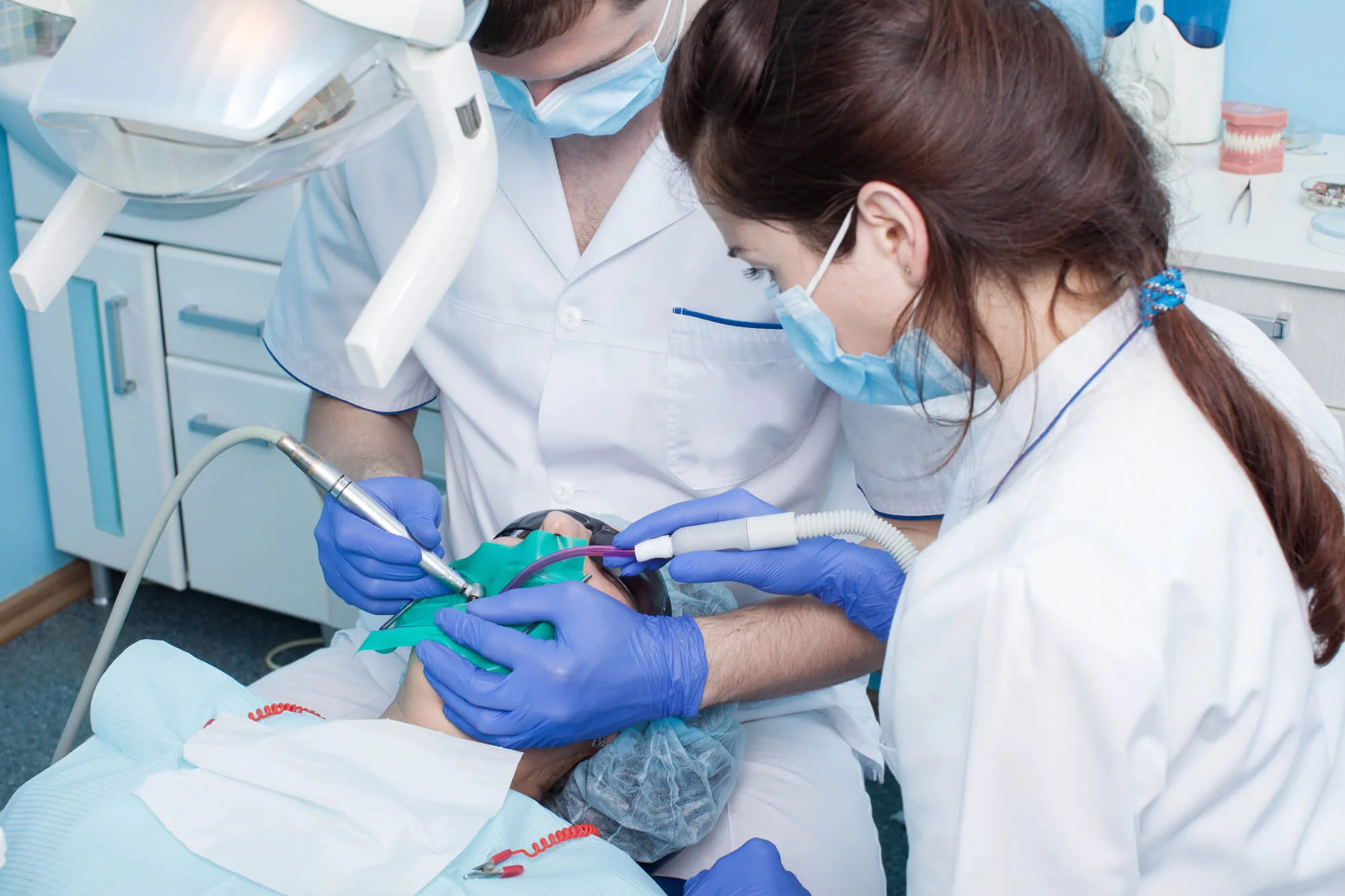 dental patient getting a teeth cleaning
