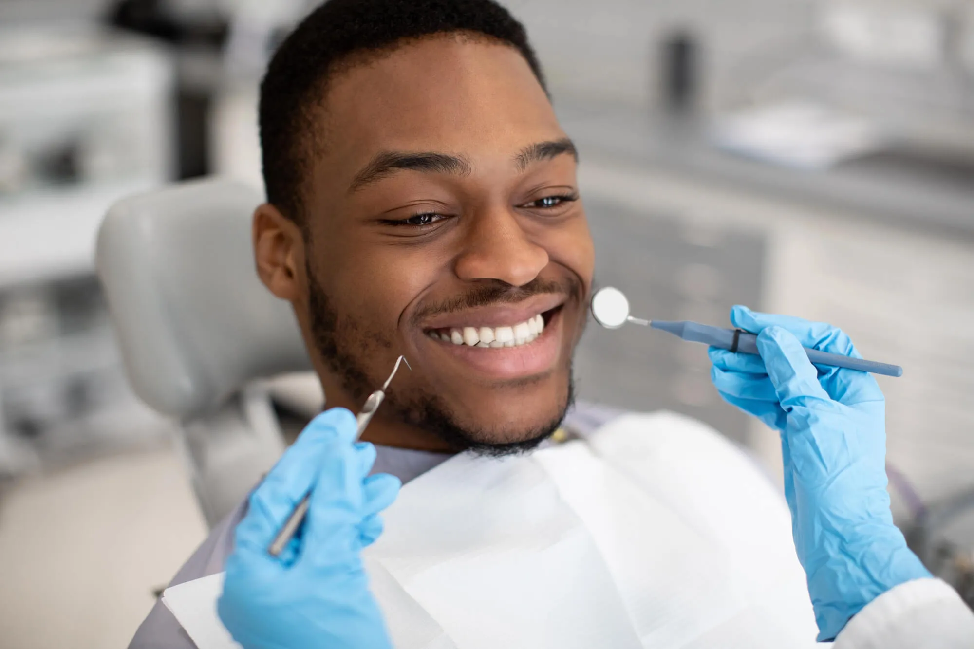 man getting a dental check-up
