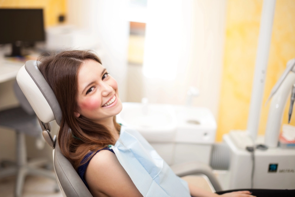 woman smiling at the dentist
