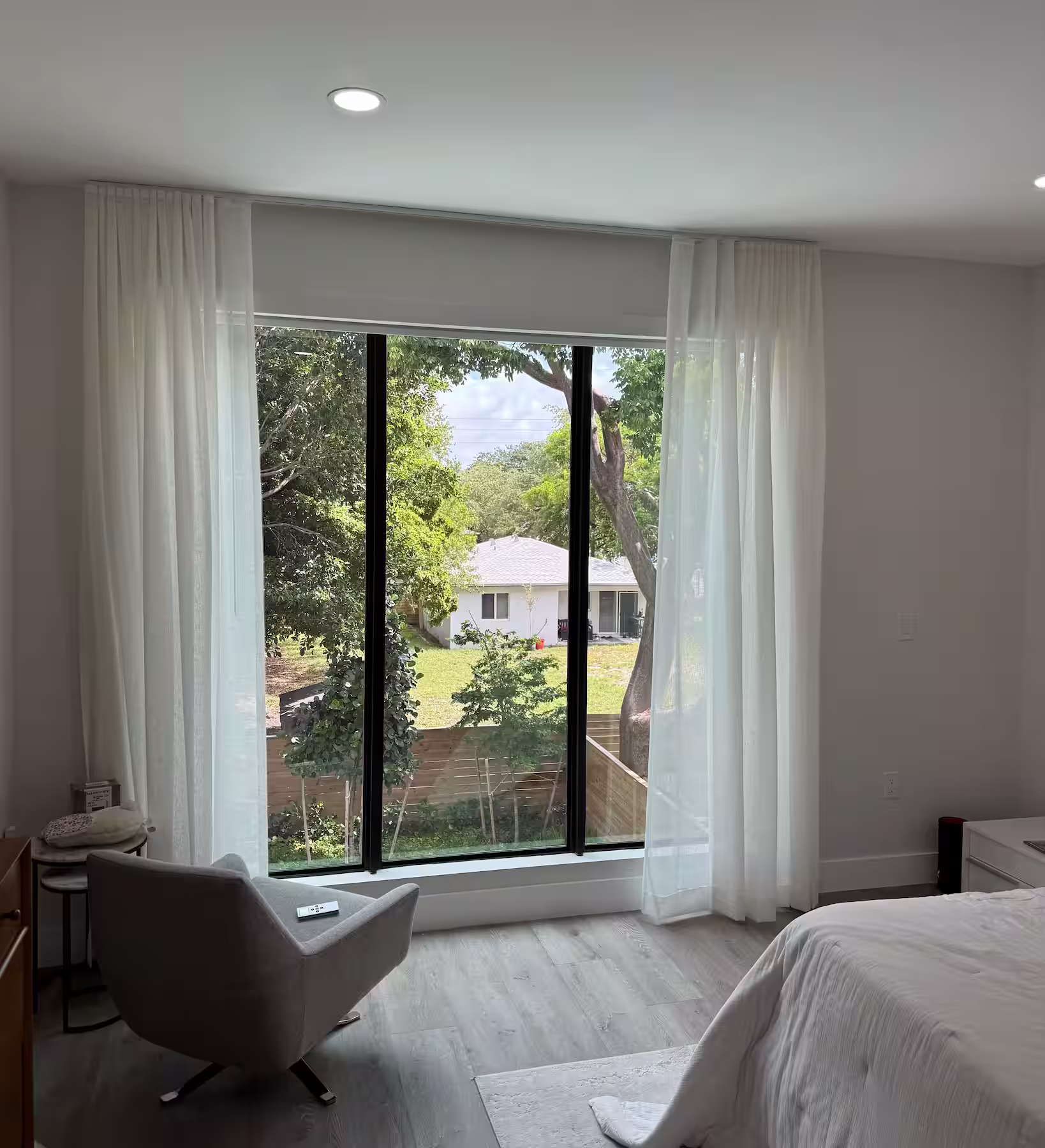 Floor-to-ceiling window treatments in a Miami high-rise condo