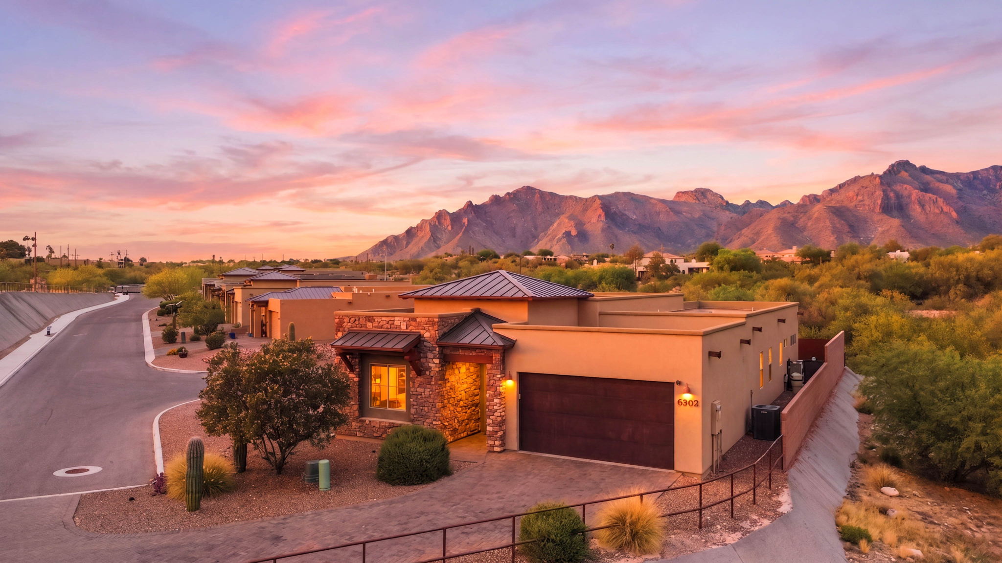 Home exterior photographed at twilight