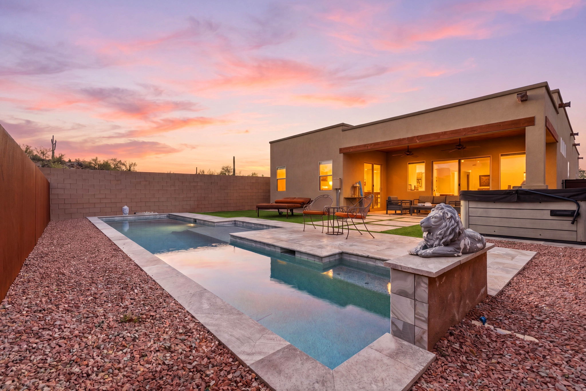 Modern backyard beneath a pink twilight sky