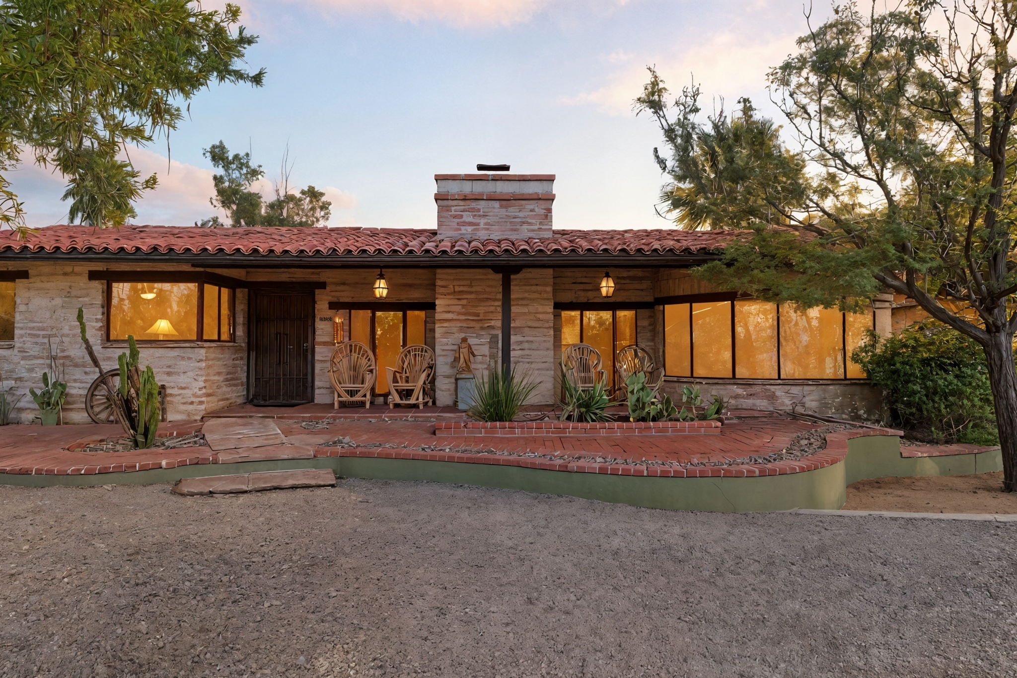 Adobe home with desert landscaping