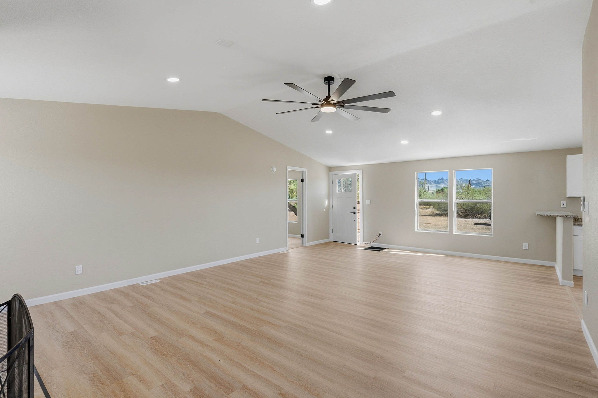 Unfurnished living room with clear floor space and unobstructed doorways