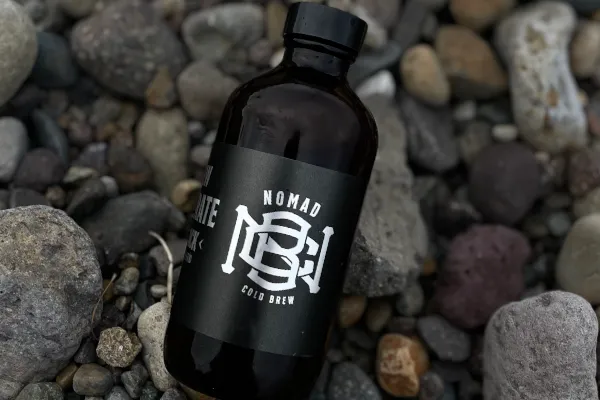 Nomad Cold Brew cans and bottles on retail shelves