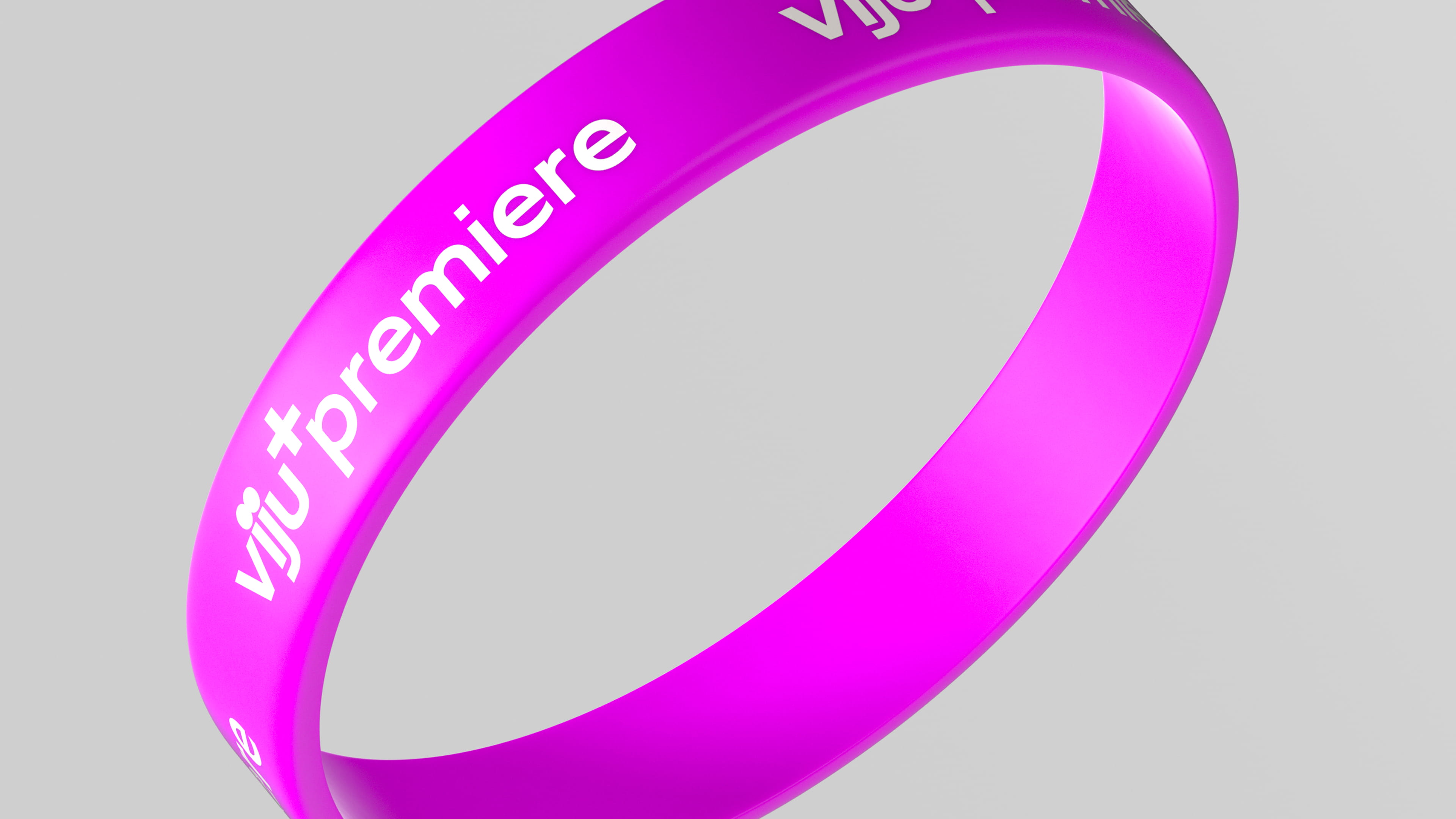 Purple silicone wristband with white text reading 'viju premiere' on a gray background.