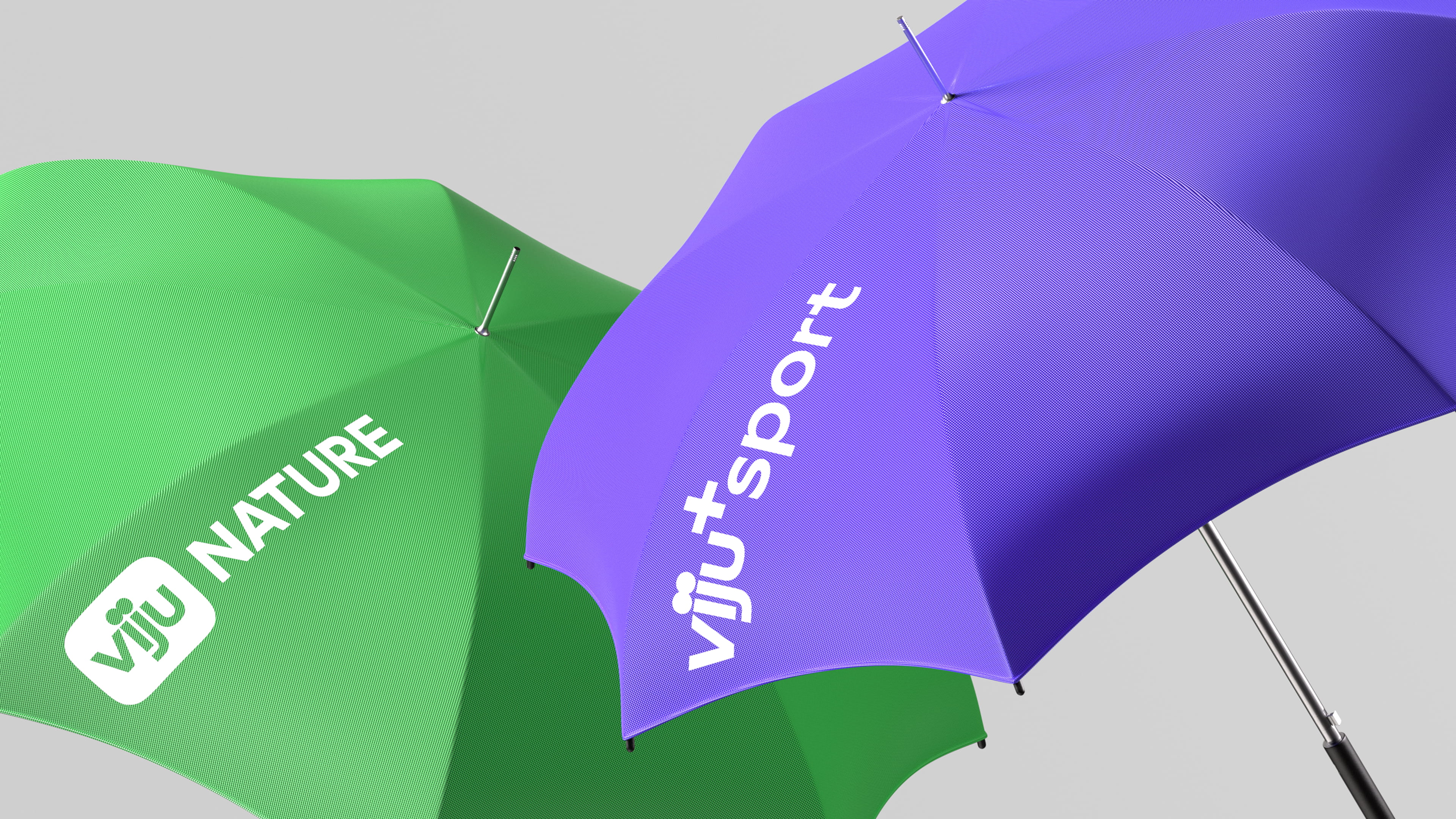 One green umbrella with 'viju NATURE' text and one purple umbrella with 'viju+ sport' text on a gray background.