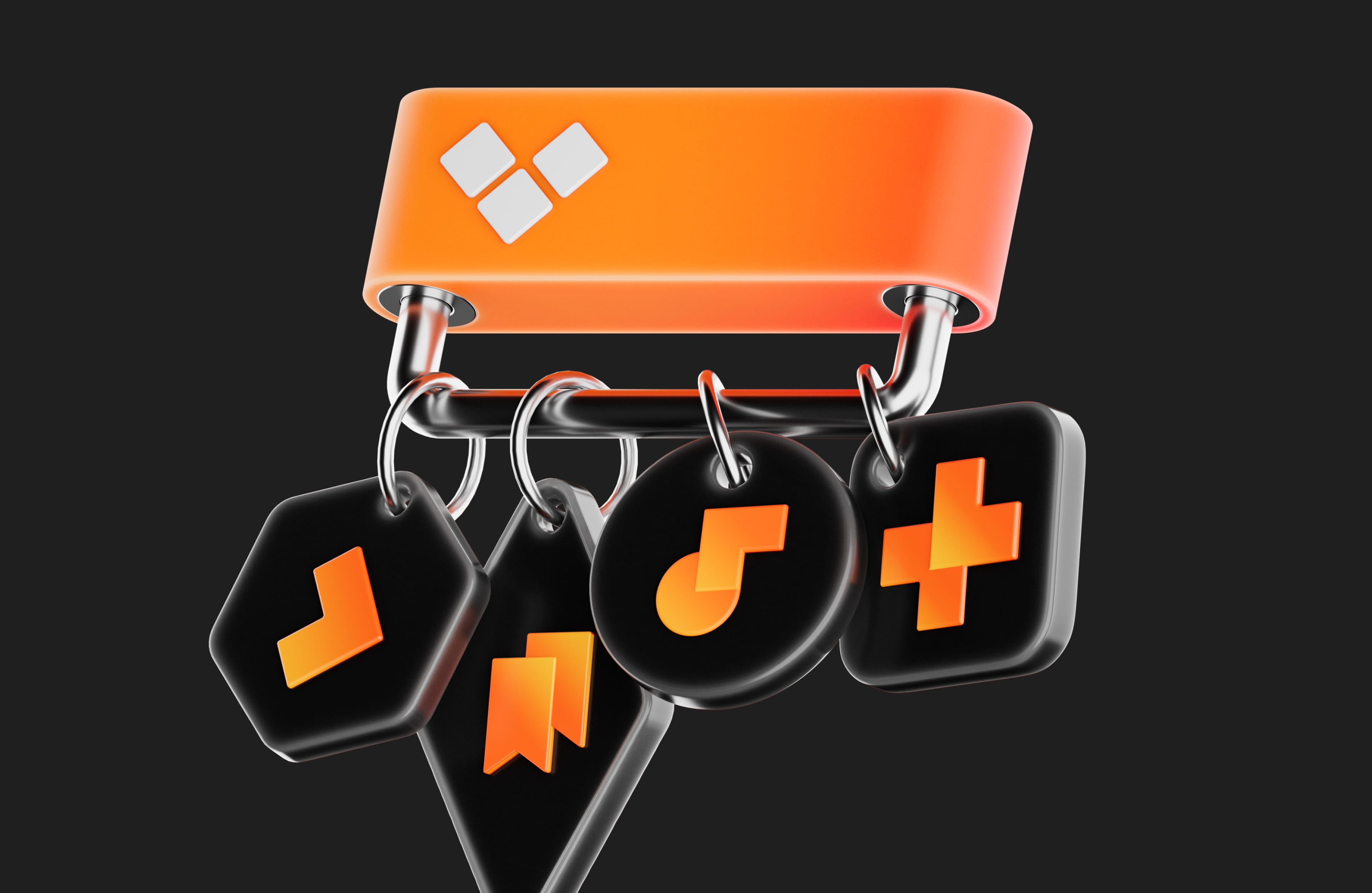 Set of black keychain tags with various orange geometric symbols attached to an orange holder.