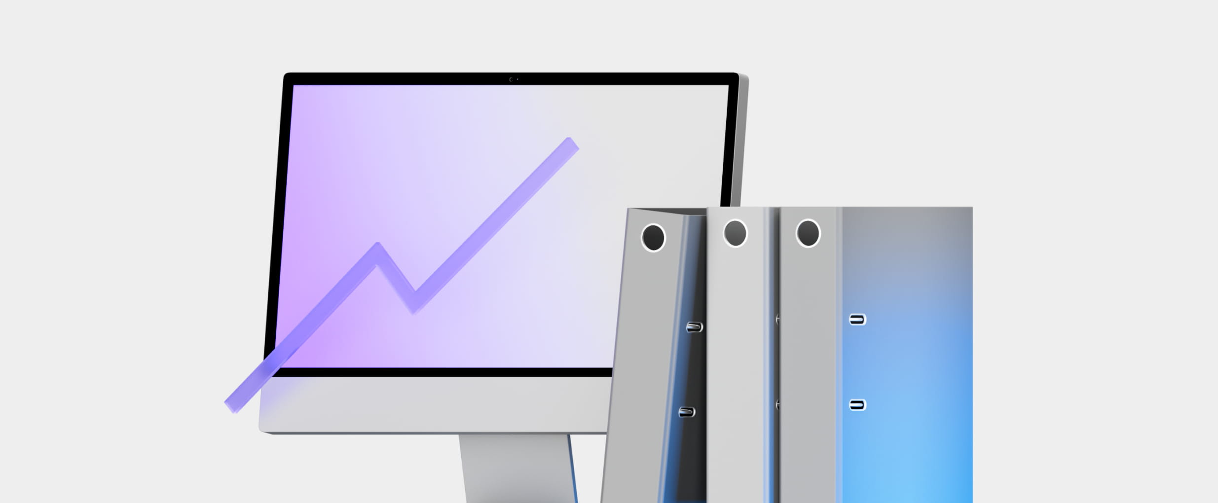 Computer monitor displaying a purple upward trending graph next to three standing gray office binders.