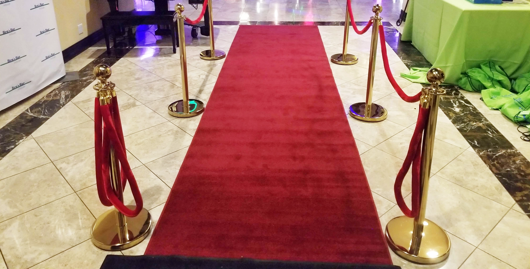 Our DJ Tampa Red Carpet & Stanchion Set up with one of our longer red carpets.