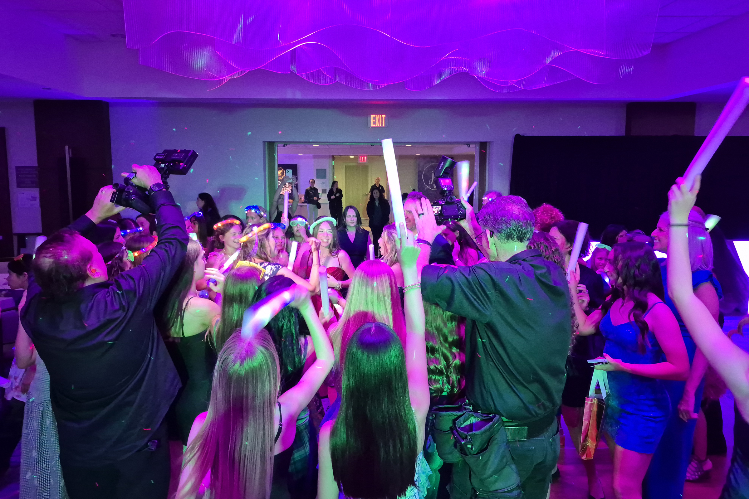Photo of the grand entrance at a sweet 16 or bat mitzvah event.