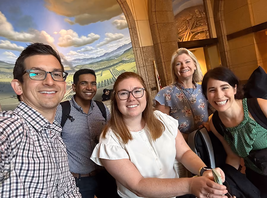 Group photo of Swiftly employees smiling together during an LA Metro site visit.