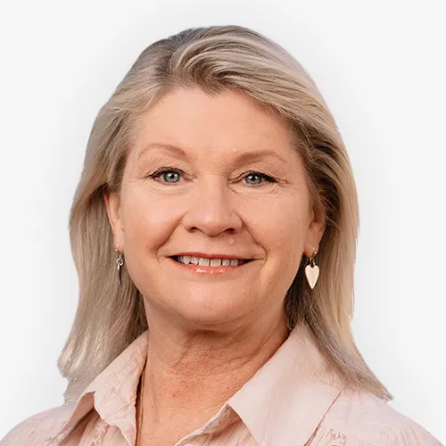 Headshot of Natalie Fedie smiling against a plain background.