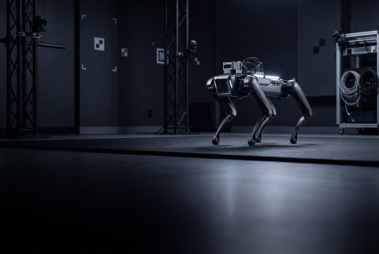 Quadruped research robot undergoing testing in a robotics laboratory.