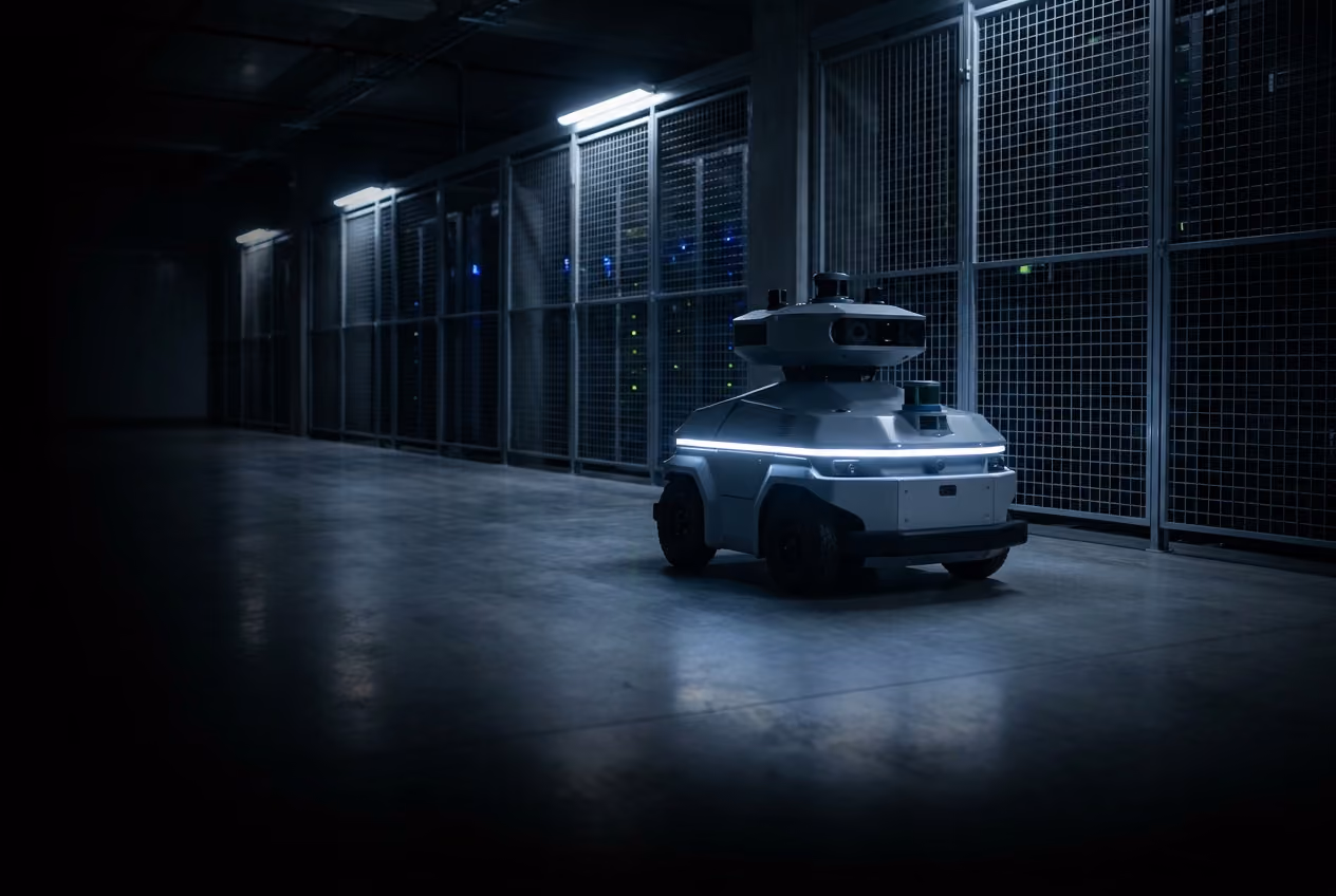 Autonomous security robot patrolling a data center.
