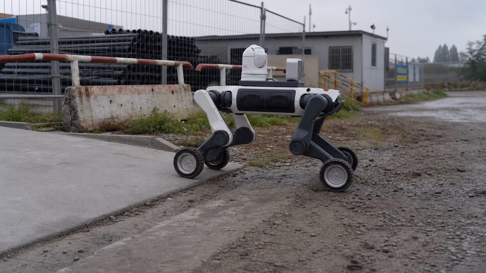 Genericized wheel-legged patrol robot crossing a qualified outdoor industrial route.