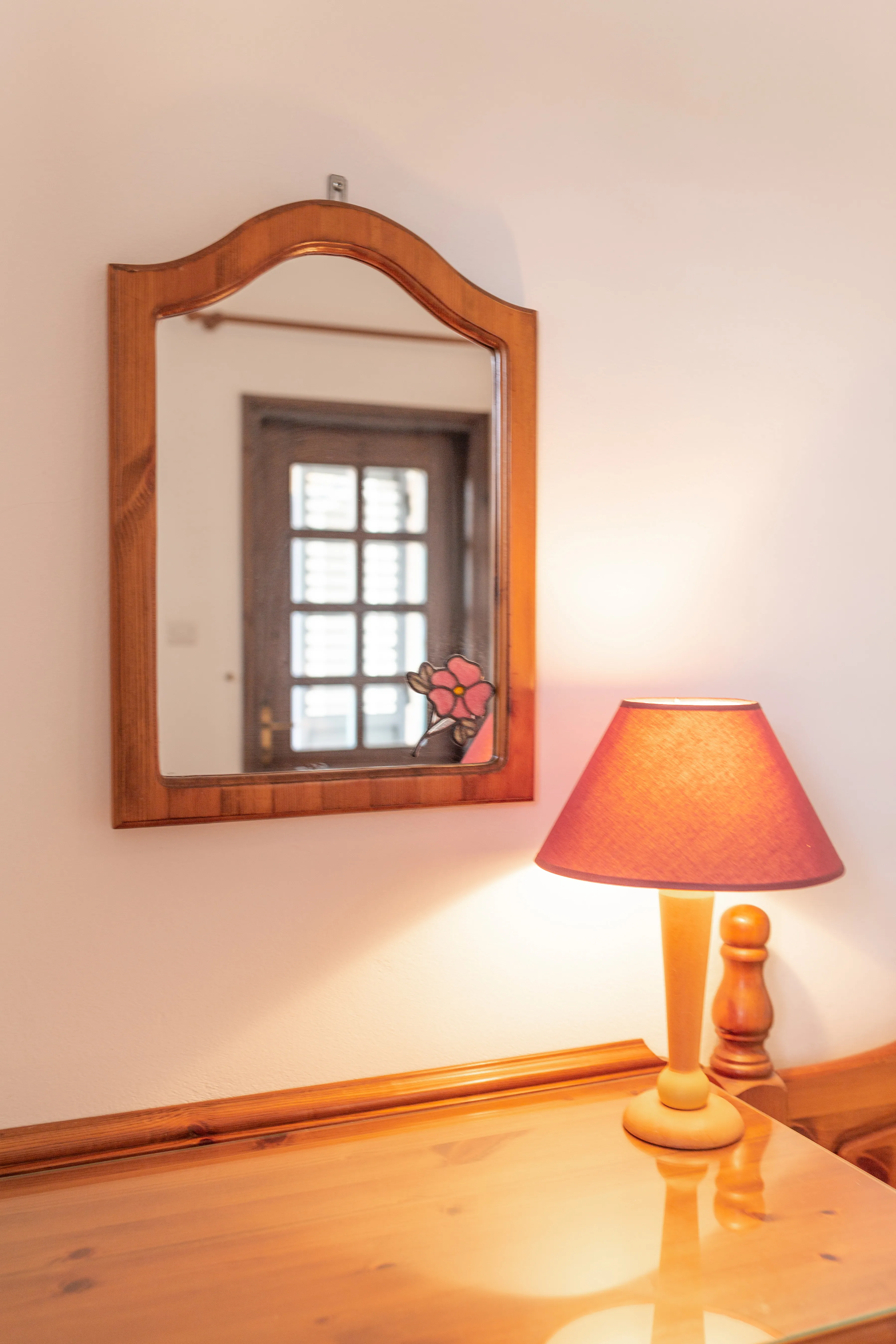 Bedroom mirror and lamp detail at Villa Nadezda