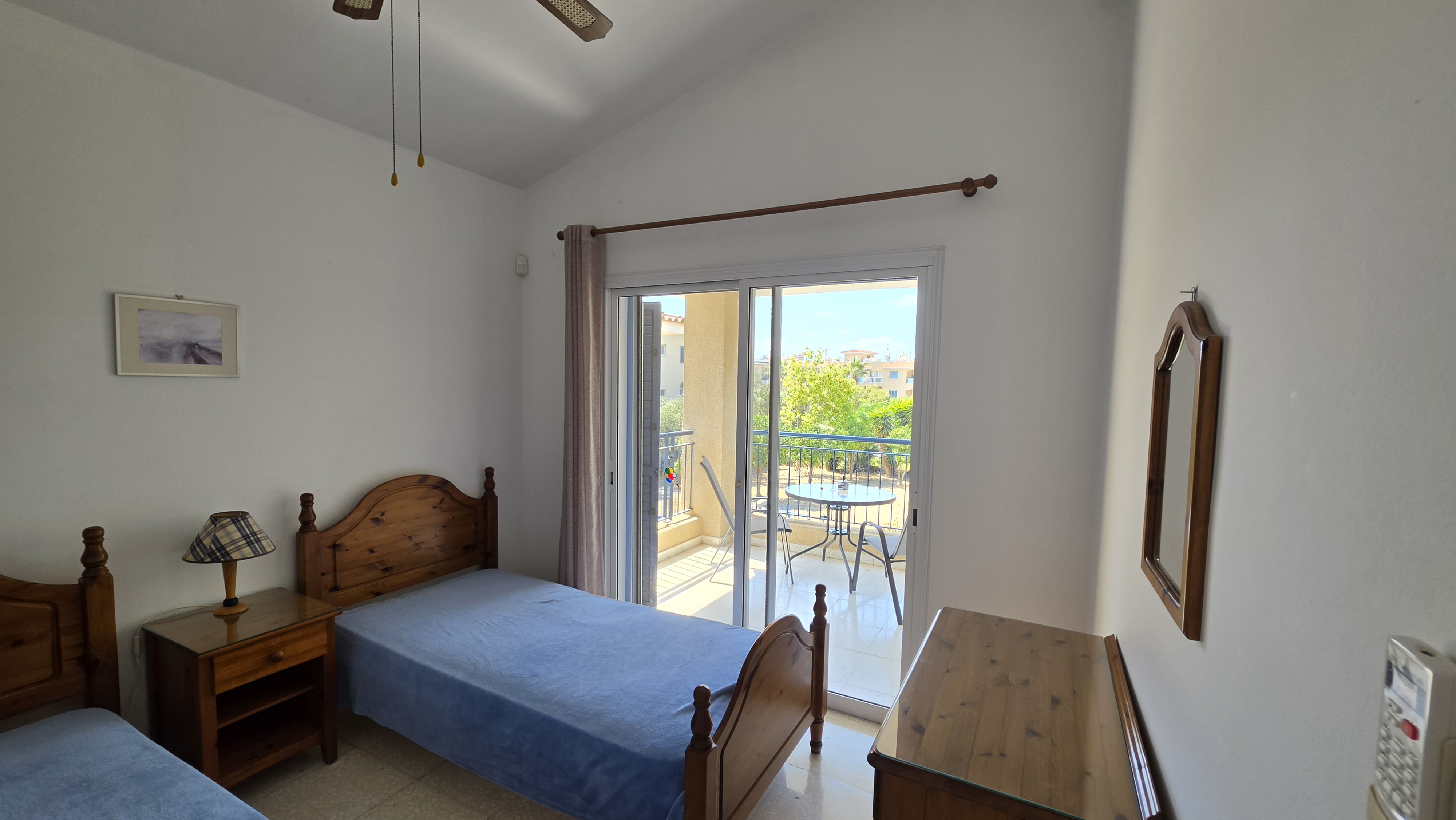 Twin bedroom at Villa Nadezda with its own balcony over the garden, Paphos