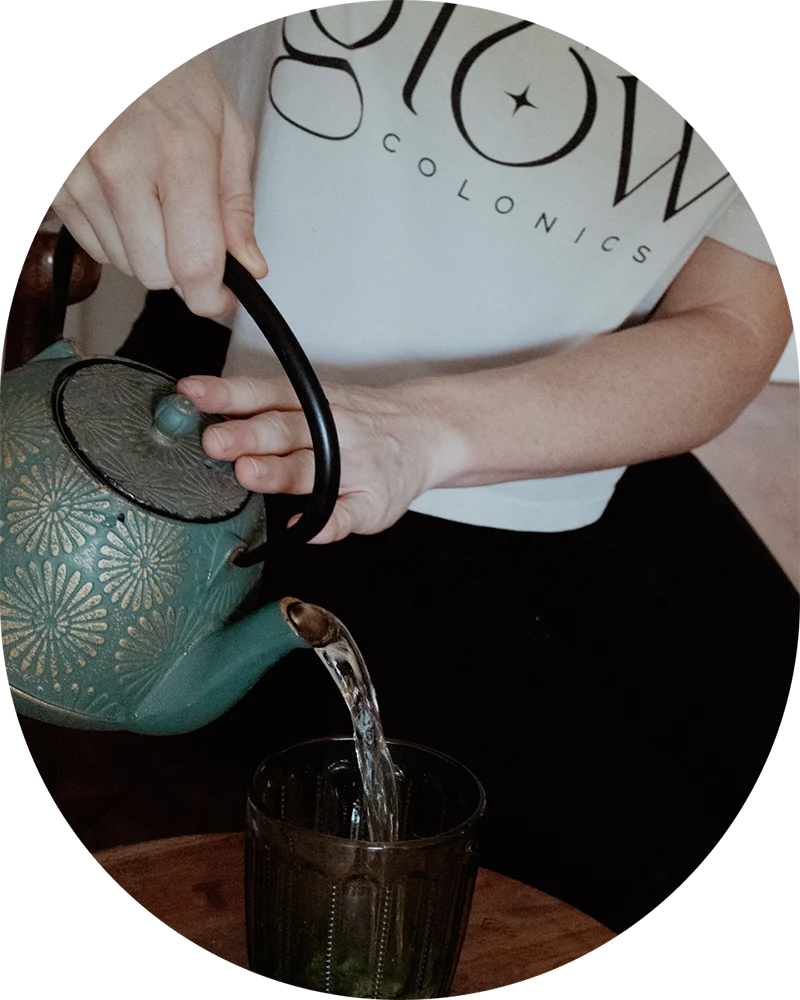 Herbal detox tea preparation at Glow Colonics wellness and colon hydrotherapy studio
