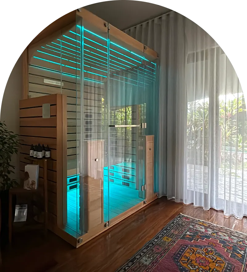 Luxury infrared sauna with LED light therapy at Glow Colonics wellness studio