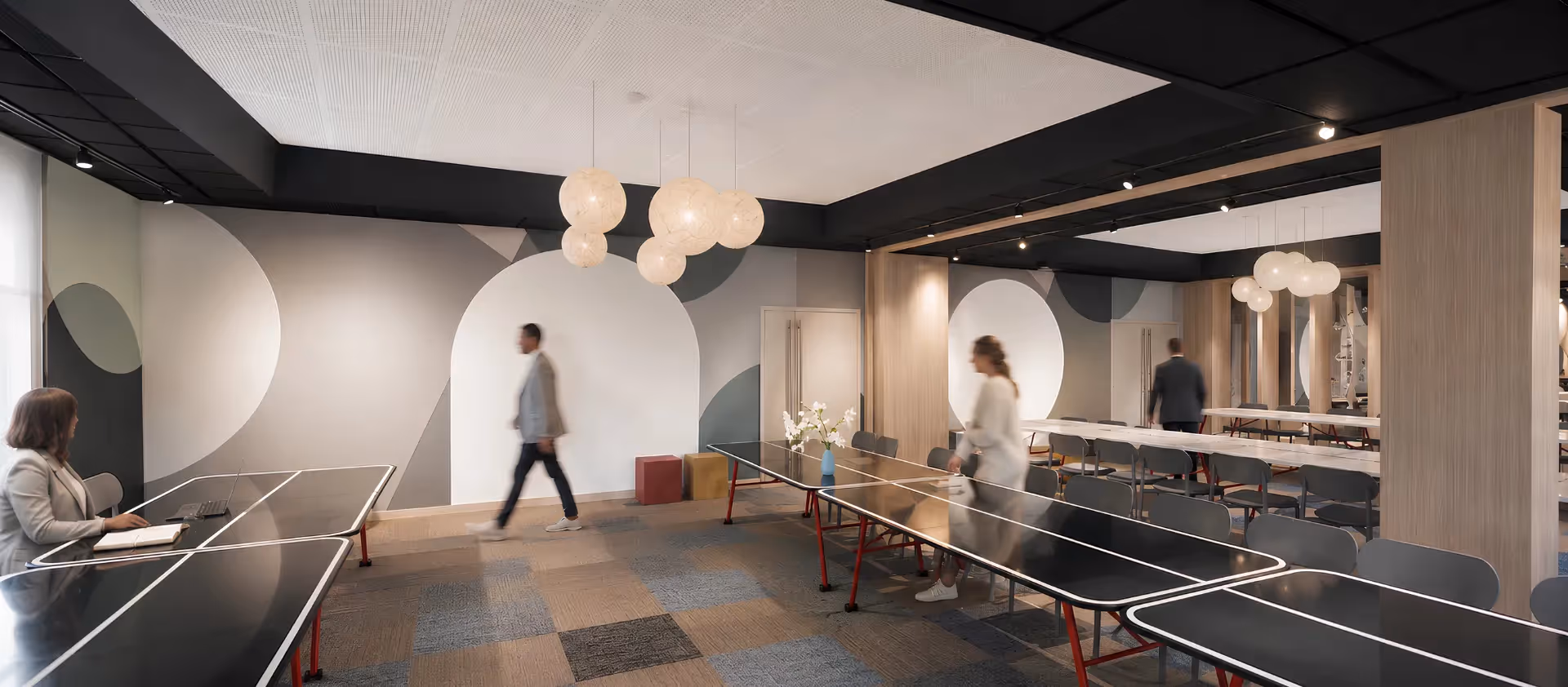 The Ysotop apart-hotel's stylish reception lobby, featuring contemporary furniture, located in the heart of Grenoble.