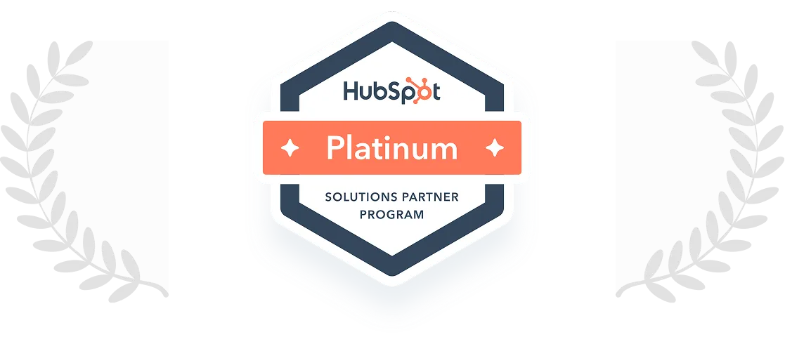 HubSpot Platinum Solutions Partner Program badge with laurel branches on each side.