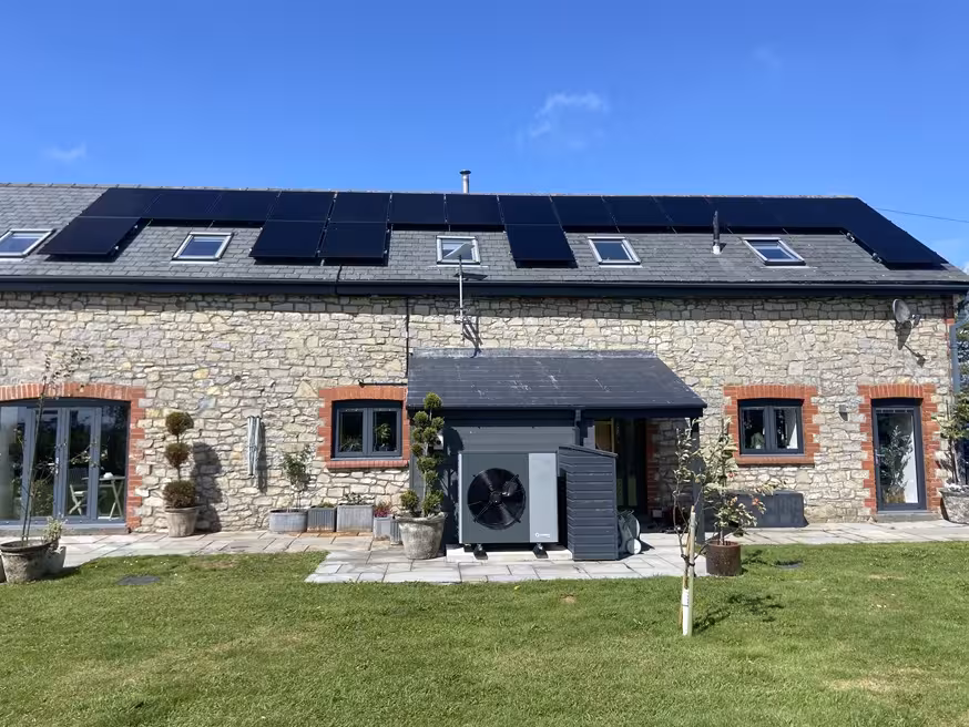 Completed solar panel, home battery storage and 20kW Ecoforest air source heat pump installation for barn conversion.