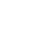 White icon of a person pointing at a board, symbolizing teaching or presentation.